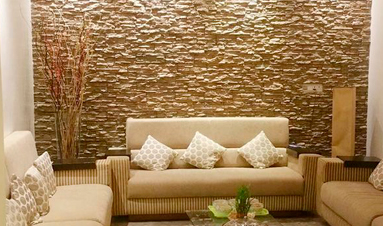 Kinara-Materiales-de-construcción-y-remodelación-blog-decorar-piedra-casa sala pared piedra