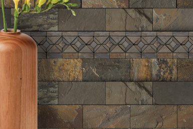 cerámica tipo piedra natural tonos tierra instalada en pared con diseño de rombos flores amarillas