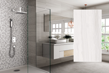 kinara-importación-distribución-ventas-revestimientos-de-construcción-25x75cm-KERALA-WHITE baño con mosaico tono claro en pared ducha y mueble madera blanco piso porcelanato formato grande tono claro