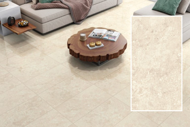 Cerámica 60 x 30 en piso de sala de oficina con mesa redonda café, y sillones grises