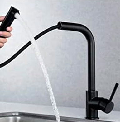 Griferia negro mate de cocina moderna con meson blanco y pared blanca de ceramica