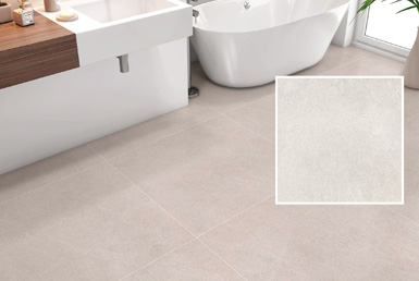 Piso de ceramica antideslizante en baño formato 60x60 cm color gris con bañera blanca y meson de baño de porcelanato