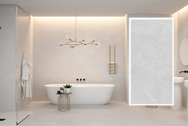 Aura-canvas-porcelanato-80x80cm Baño con bañera blanca larga y con accesorios dorados y pisos de porcelanatos formato grande blanco