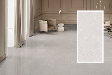 French-smoke-porcelanato-tipo-marmol Sala elegante y moderna, con pared tipo beige, y aciendo de fondo blanco con lampara, y piso de cerámica tipo marmol
