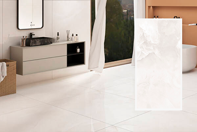 Jennifer-white-porcelanato-formato-grande-60x120 Baño moderno con piso de porcelanato blanco, con un mesón de fondo blanco.